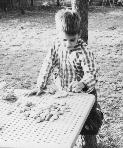 Six-year old Alan Goldstein with his first rock collections in 1965.