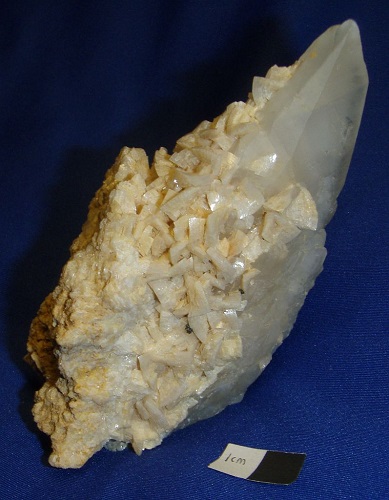 Dolomite encrusting calcite; from the upper vuggy zone.