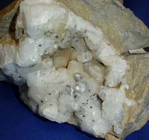 Calcite with chalcopyrite coated with green malachite
