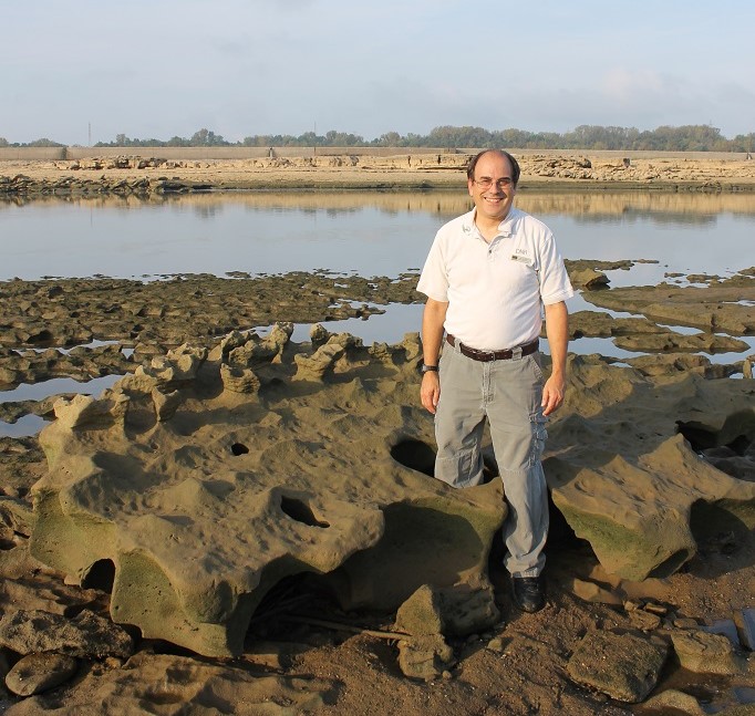 I'm standing at 'chicken rock,' a Devonian boulder only accessible a couple of days a year at the Falls of the Ohio.
