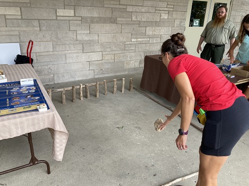 What can you do with those heavy, solid geodes? How about geode bowling? This activity was invented for the Indiana State Fair and adopted for Digging the Past. Rather than knock them all down, one just has to topple one driftwood pin to get a prize. 