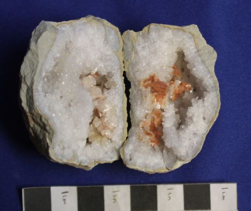 Dolomite, notice on one side the mineral is pink, and on the other it is orange, colored by iron. Harrodsburg, IN. Collected March 1989. 