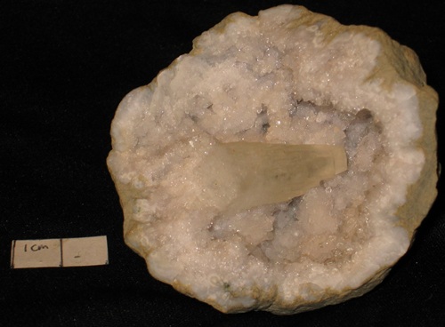 Calcite crystal in a quartz geode. This is an example of a lucky break when opening the geode, collected in November 1984 on the north side of the Harrodsburg, IN, exit.
