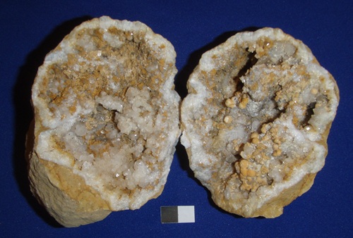 Brown goethite is usually a powder, but occasionally forms needle-like crystals. This geode also has calcite spheres and dolomite. Meade Co., KY