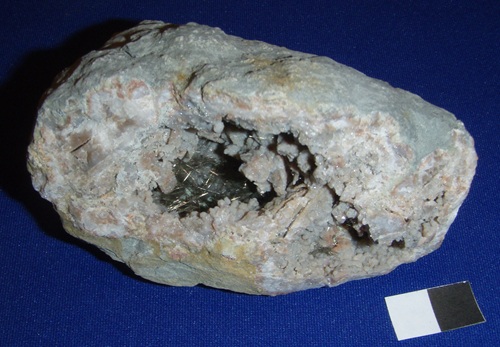 Millerite looks like brassy hair. The crystals are very thin. Halls Gap, Lincoln Co., Kentucky, is the most famous location of geodes with millerite. 