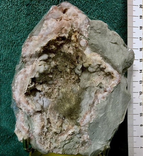 Millerite in a brassy hair-like tuft with chalcedony. Halls Gap, KY. Bob Harman specimen and photo.