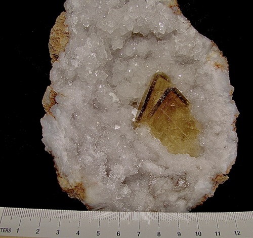 Barite with zoning, possibly from sulfide inclusions (pyrite or marcasite). Monroe Co., Indiana. Bob Harman specimen and photo. 