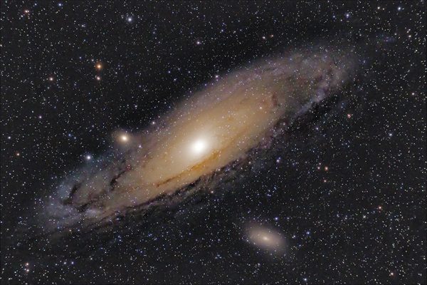 The Andromeda Galaxy with dwarf companions M32 (above) and M110 (below). Ron Yates photo.