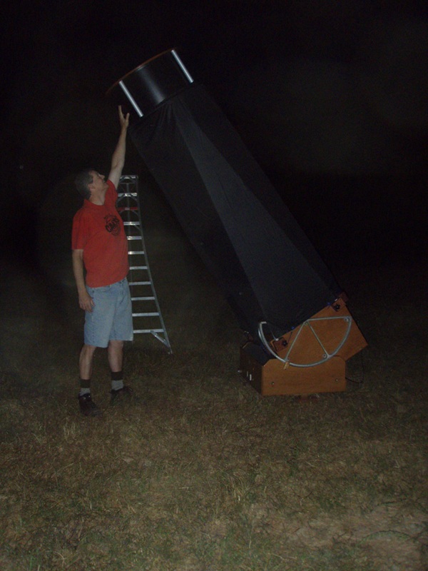 An observer with a 25-inch telescope