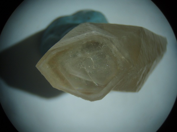 Photo Inc3, A calcite crystal with a gas inclusion in the center. FOV = 35m