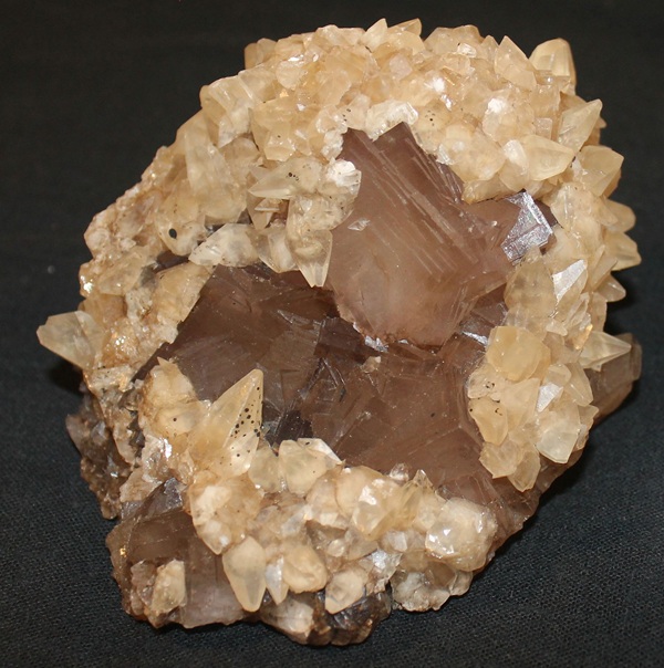 Photo C8, Scalenohedral calcite on fluorite, from the Alcoa mine on the Rosiclare vein. Ben E. Clement Mineral Museum specimen.