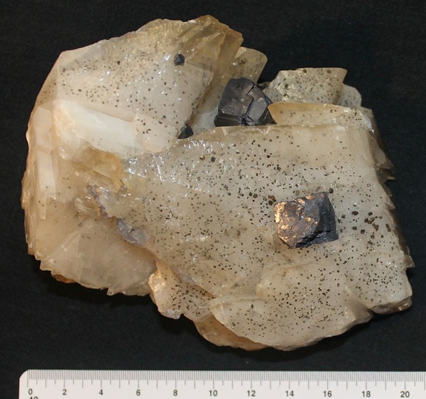Photo Ga2, Galena in cubes modified with the octahedron on calcite with chalcopyrite inclusions. Gaskins mine. Ben E. Clement Museum specimen.