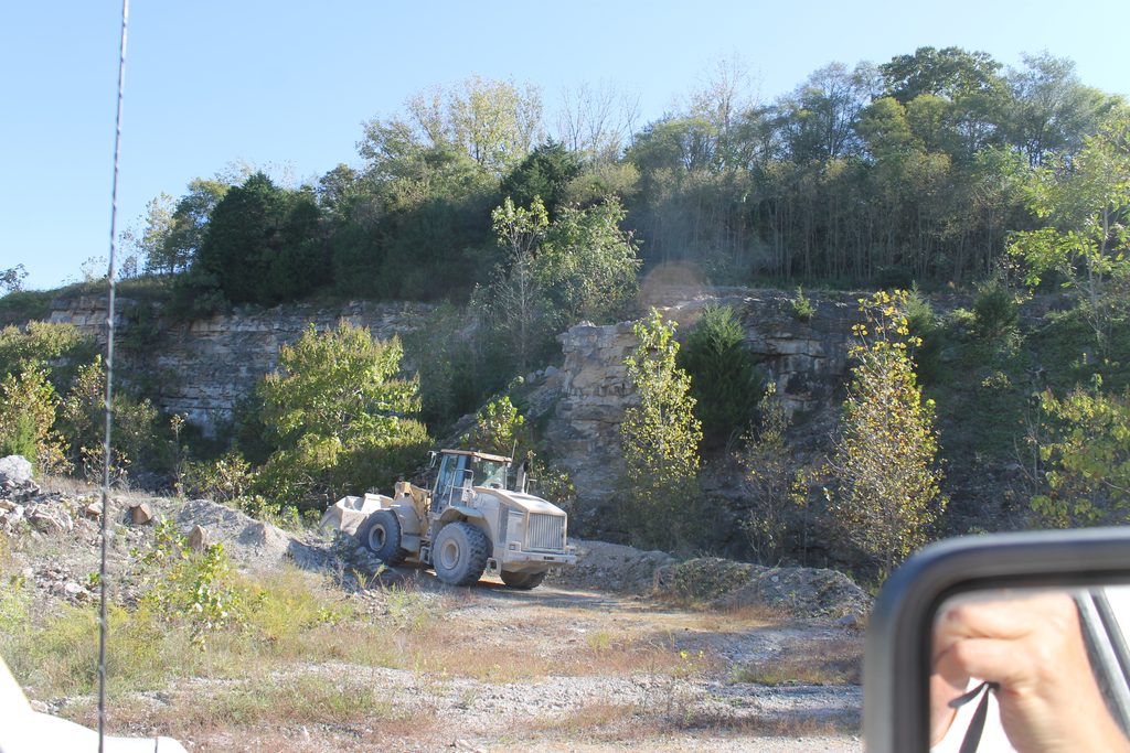 Frontend loader removing a barrier of gravel so we could drive to the north end on the bench.