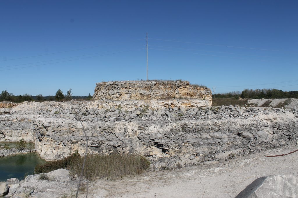 An "island" surrounding a powerline pole. There is ground access behind it, but most inspections are carried out by helicopter.
